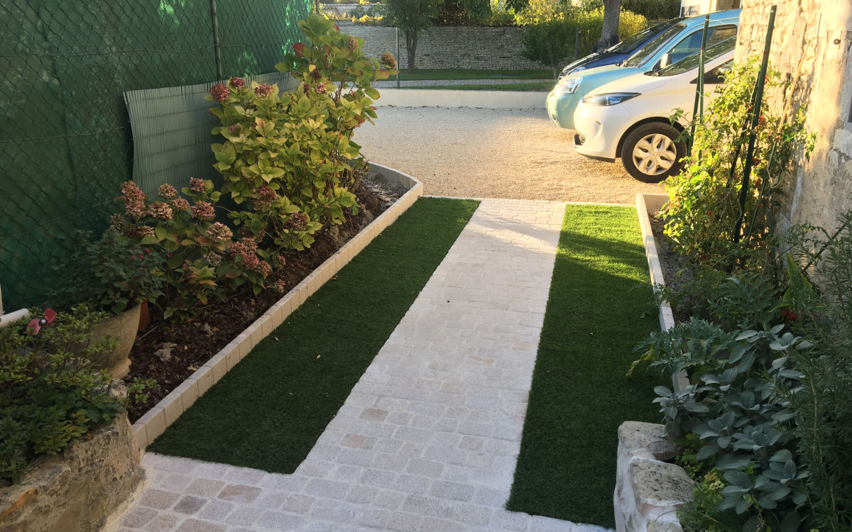 Ralisation Alle de garage en DM Green et pavage  La Rochelle conue le 14/12/2025