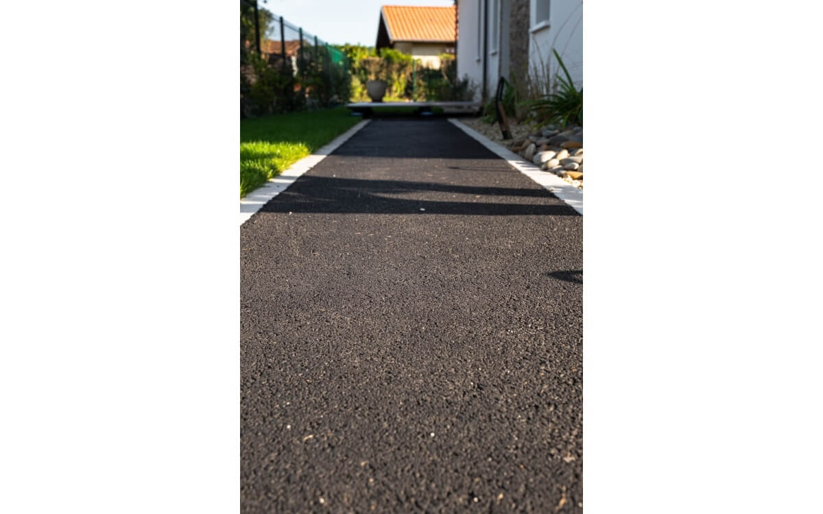 Cr�ation All�es pi�tonnes et entr�e en garage en enrob� � chaud et pav�s la couture� � LA TESTE DE BUCH con�ue le 27/09/2024