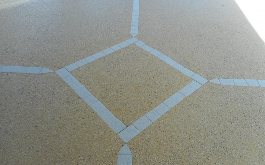 R�alisation Motif en pav� La Couture� � Saintes con�ue le 13/12/2025