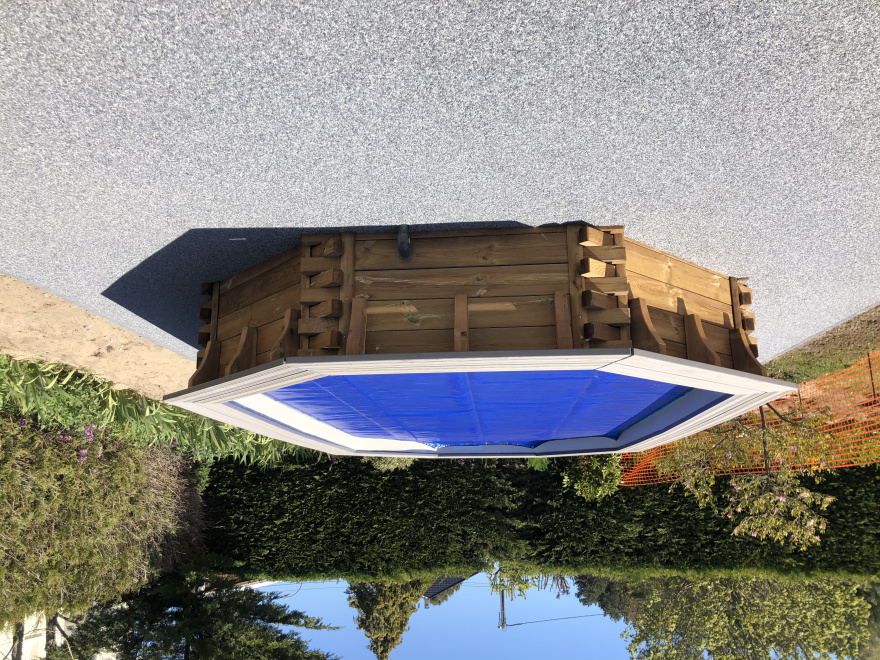 R�alisation Plage de piscine en Hydrostar� gris perle � CAMPAGNE LES HESDIN con�ue le 30/09/2021