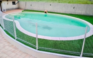 Plage de piscine en DM Green®, bordures Pavé la Couture® et Hydrostar®8527