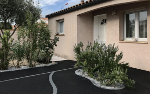 Entr�e de maison en enrob� noir � chaud8438