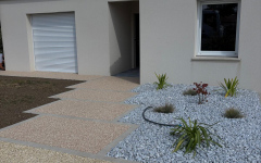 Entr�e de maison en Hydrostar� et Pav� la couture�